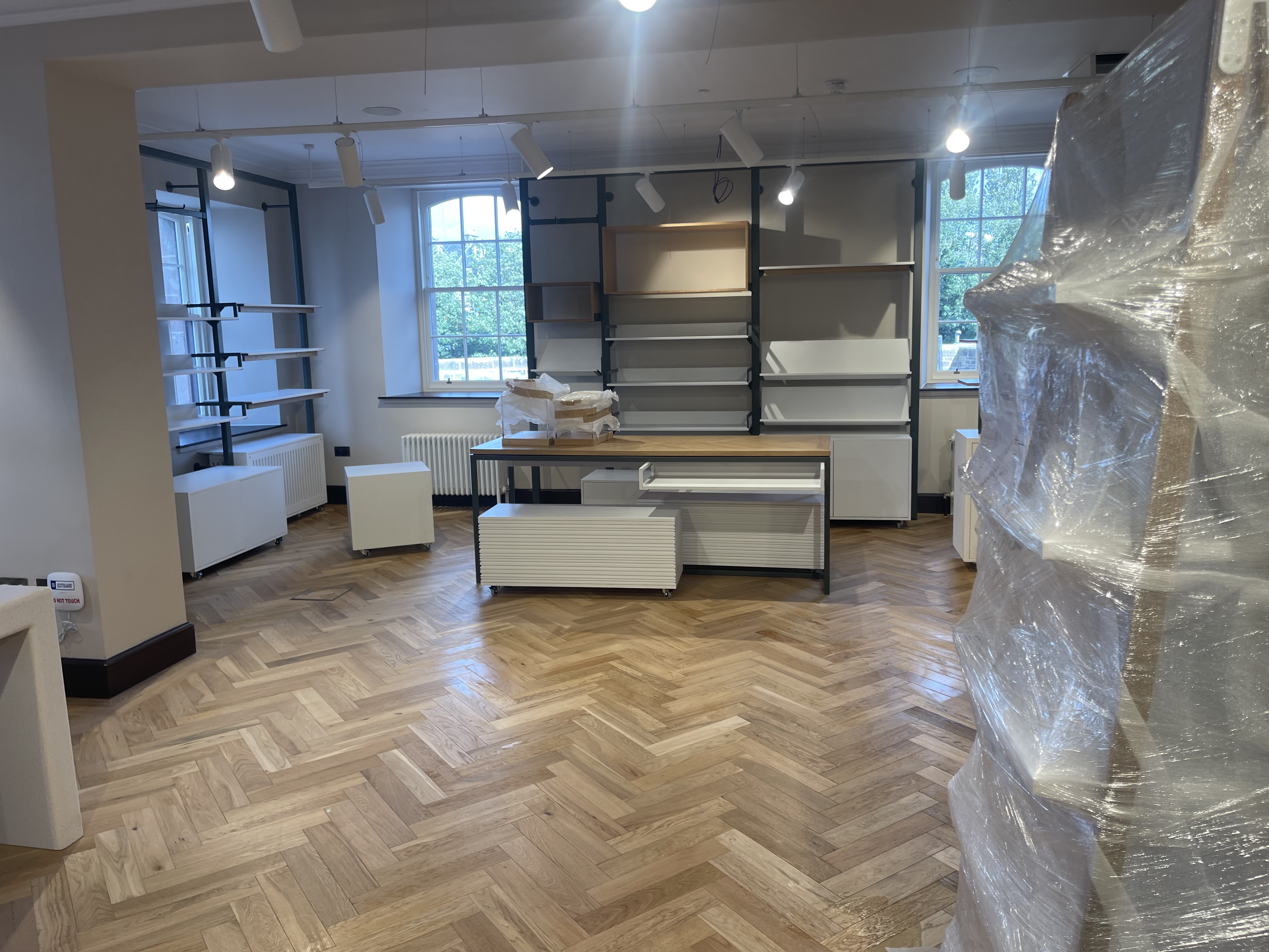 Retail display area with parquet floor during fit-out work