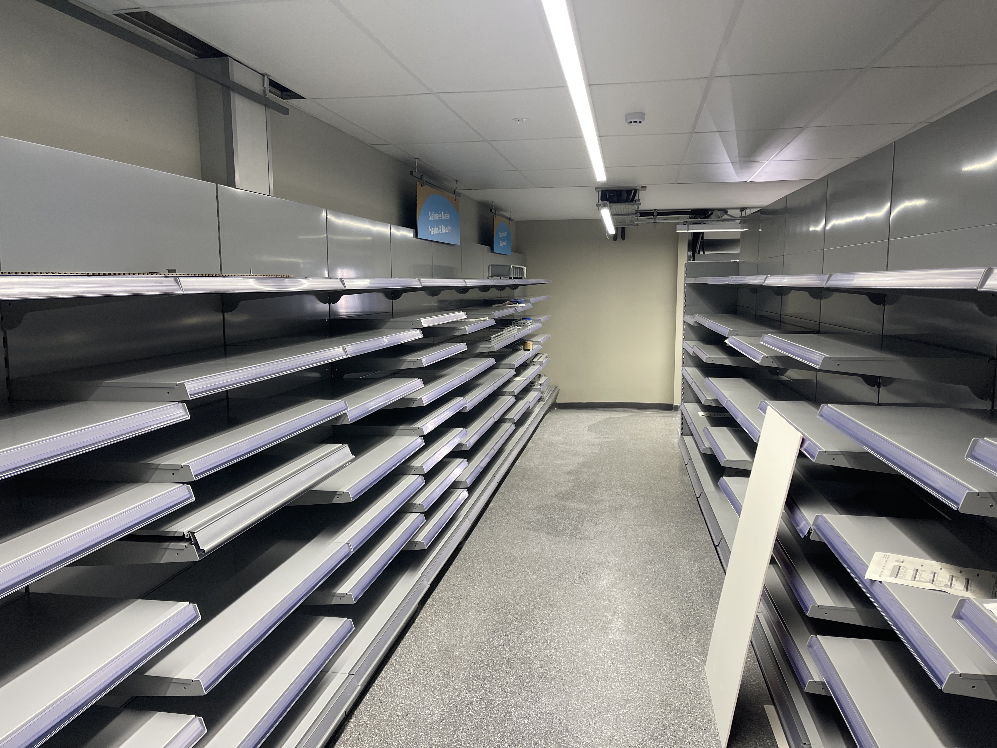 Clean retail shelving ready for stock